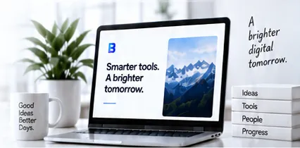 A laptop reading “Smarter tools. A brighter tomorrow.” beside a mug, books labelled Ideas, Tools, People and Progress, and the handwritten words “A brighter digital tomorrow.”