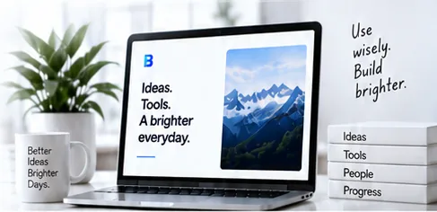A laptop reading “Ideas. Tools. A brighter everyday.” beside a mug, books labelled Ideas, Tools, People and Progress, and the handwritten words “Use wisely. Build brighter.”